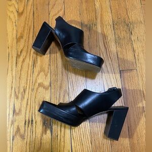 Black, leather slingback heels by Robert Clergerie Paris